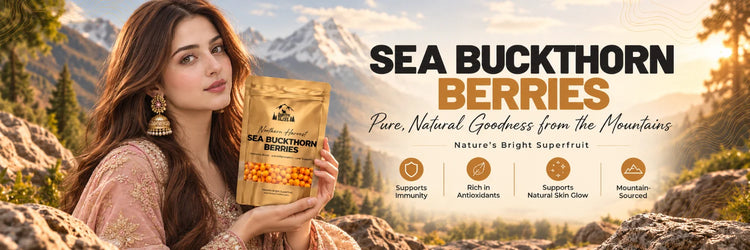 Pakistani woman holding The North Bliss Sea Buckthorn Berries pouch in a mountain setting, highlighting immunity, antioxidants and natural skin glow